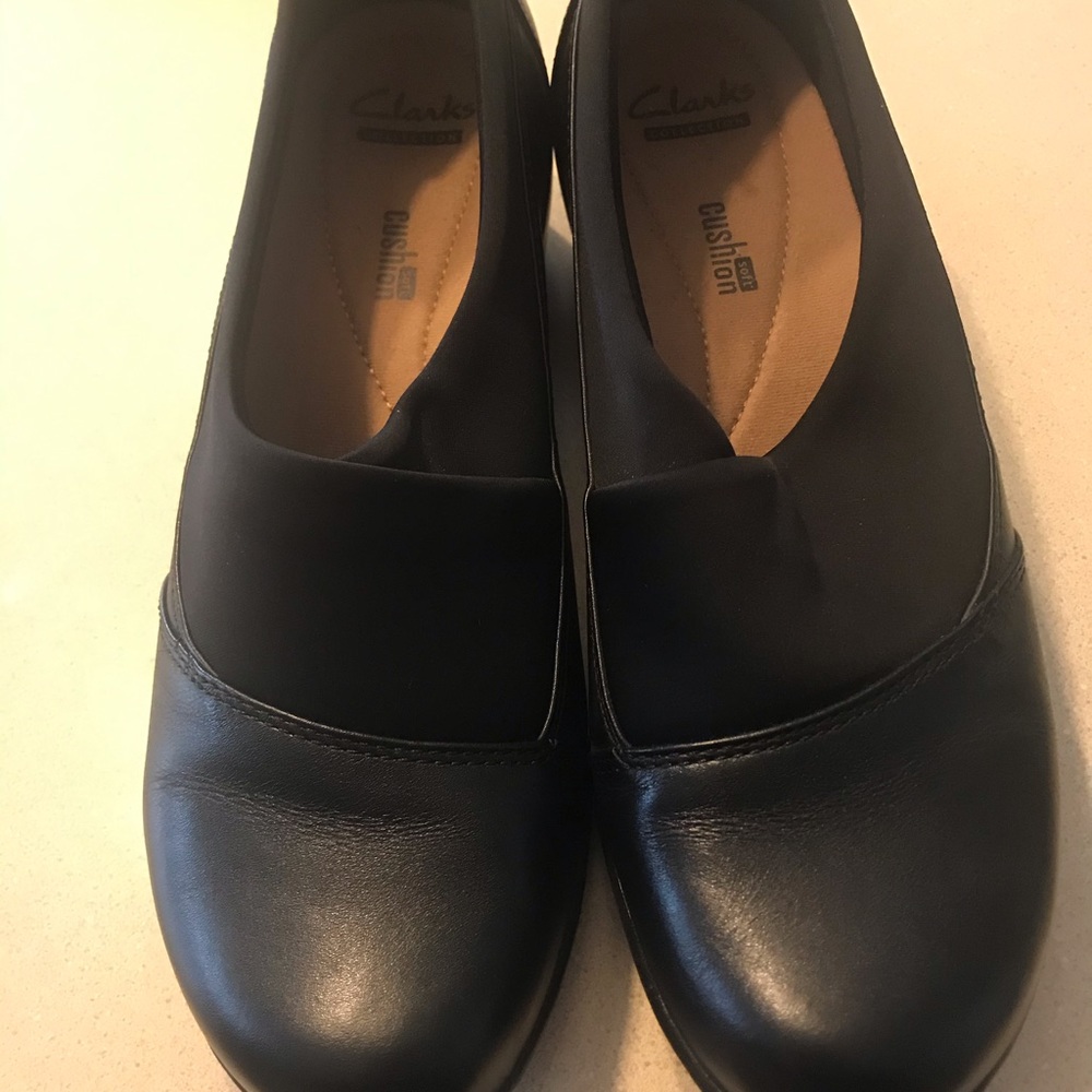 Clark’s black slip on shoes